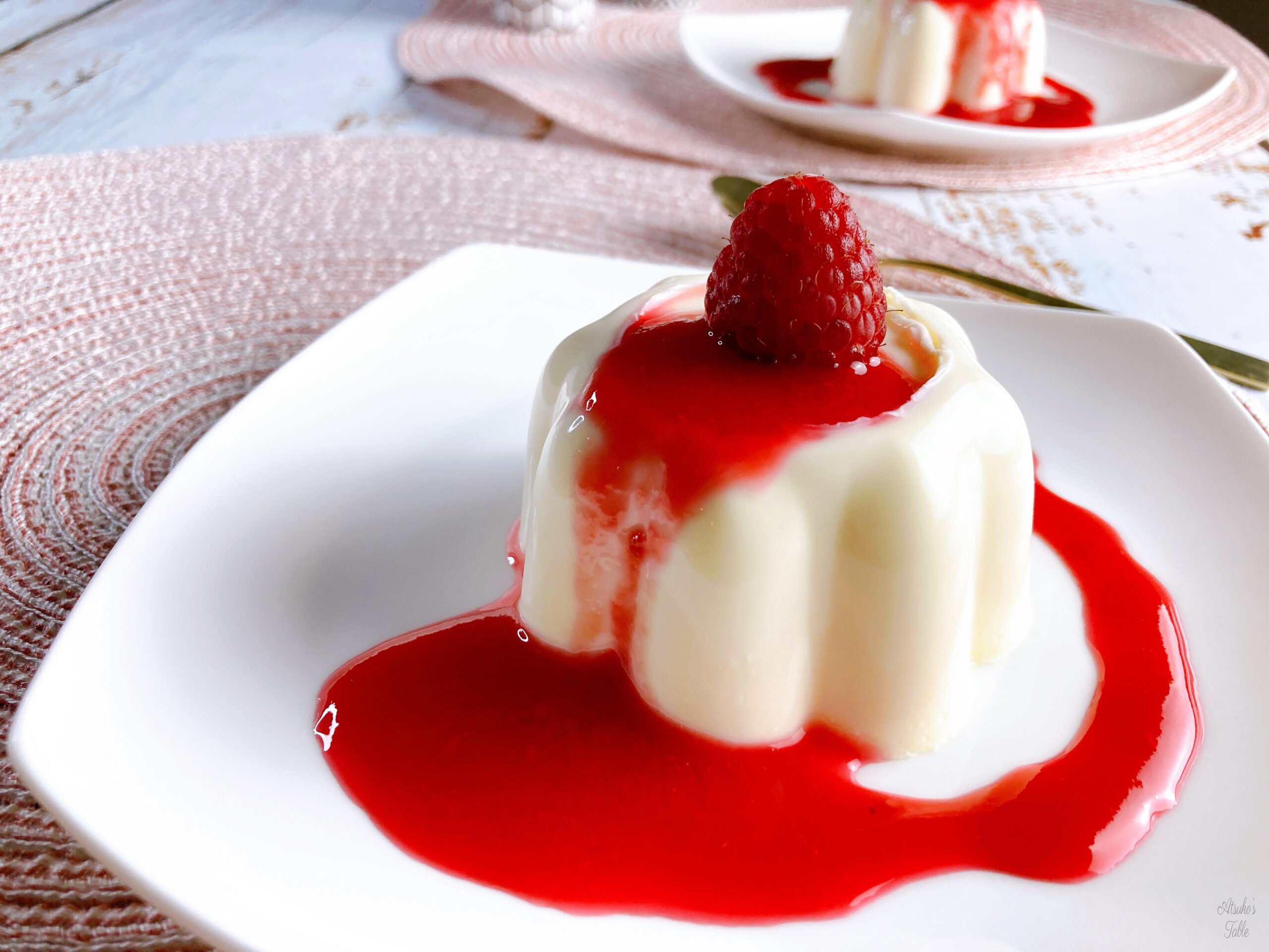 panna cotta with raspberry sauce a raspberry