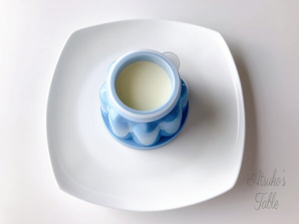 cup of panna cotta on the plate