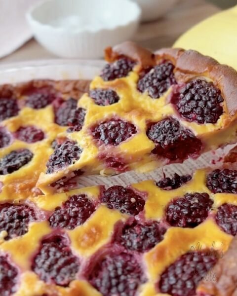 a piece of blackberry clafoutis