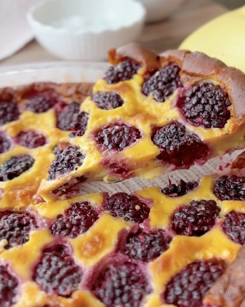 a piece of blackberry clafoutis