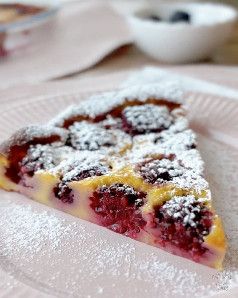 a piece of blackberry clafoutis with ice sugar